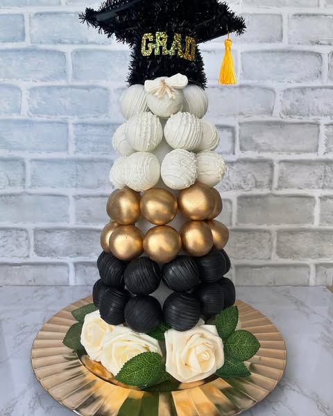 Sweet Natalia black, white and gold graduation dessert tower